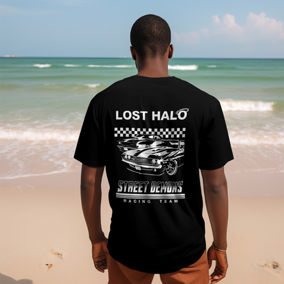 man wearing Lost Halo Streetwear tshirt on the beach